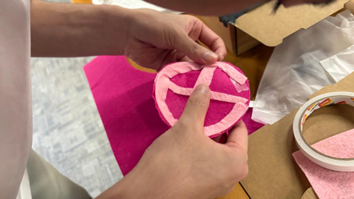 Fabric decoration - pink circular pattern